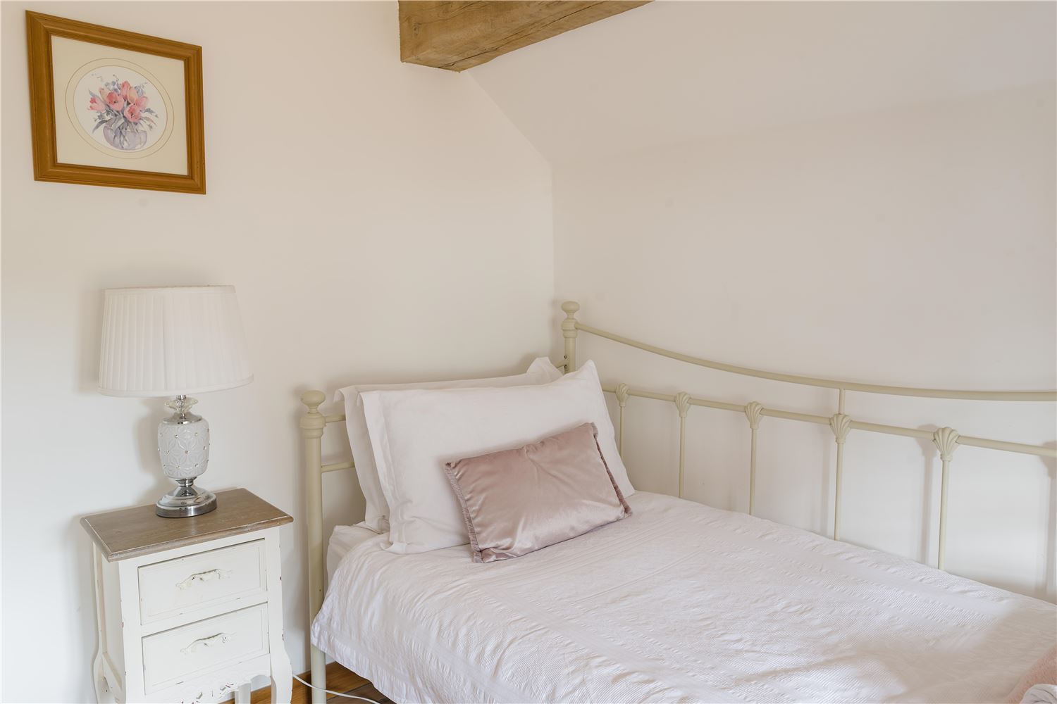 Bedroom 2 offers a cosy double bed, while Bedroom 3 is a delightful full-sized single brimming with Dorset cottage charm.